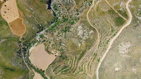 Aerial-top-down-view-of-the-mountain-landscape-near-Preveli-gorge,-on-the-southern-coast-of-Crete
