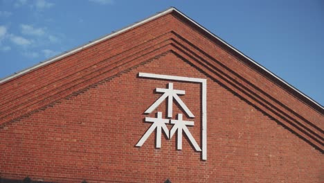 Close-up-to-the-word-wood-in-Japanese-from-the-Kanemori-Red-Brick-Warehouse,-Hakodate-Japan