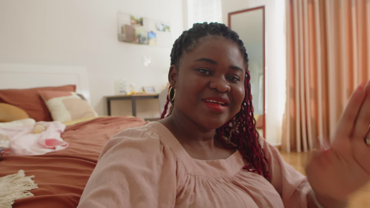 POV of African American Mother with Baby Calling on Video