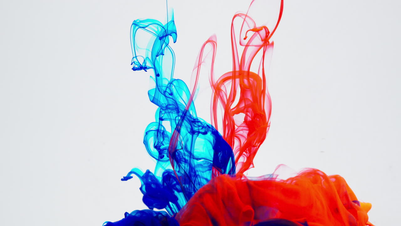 Red Ink Cloud Explosion in Water on White Background, Creative Abstract Visual