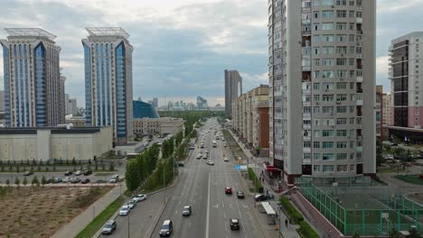 driving on busy streets of astana at sunset in kazakhstan