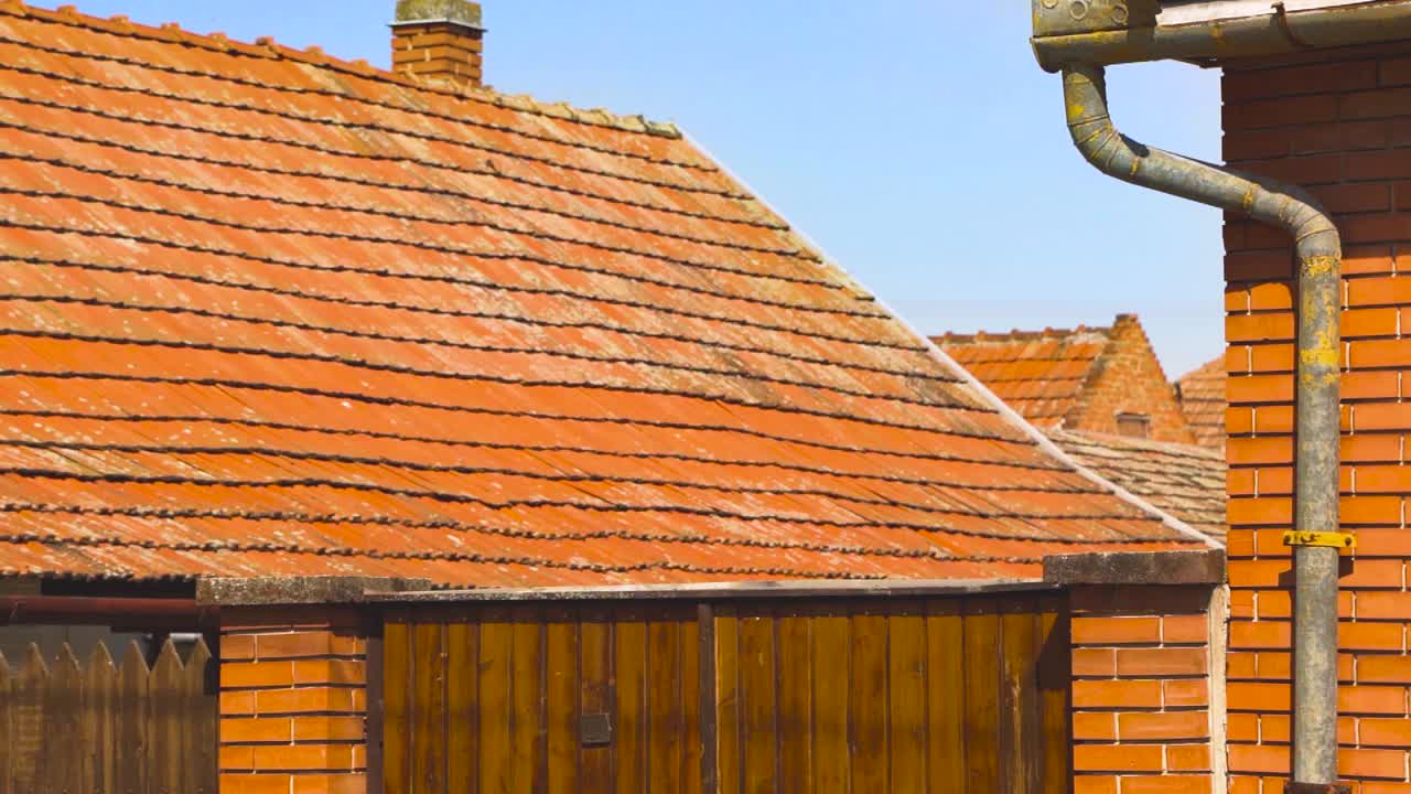 Terracotta bricks and tile roofs, cinematic gimbal shot