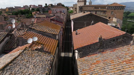 ancient town with brick stone roofs over stimigliano in lazio, italy