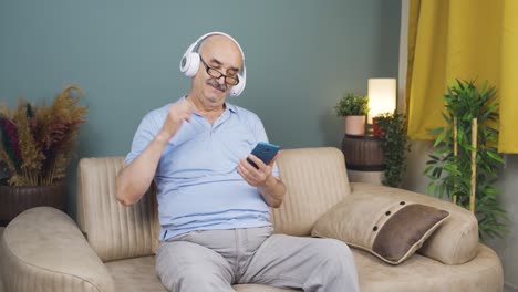 Old-man-listening-to-music-and-relaxing.-Relax-and-peaceful.