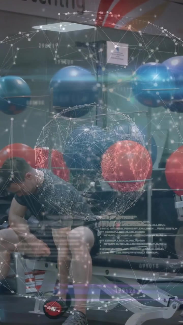 Vertical video: Seated man picking up red dumbbell performing curls in gym as globe overlay moving
