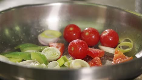 cooking vegetables in a pan
