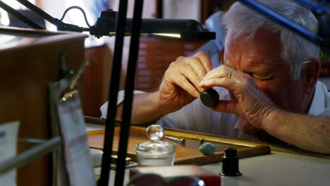 horologist repairing a watch