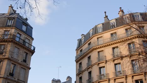 iconic parisian buildings on warm sunny autumn day, pan left