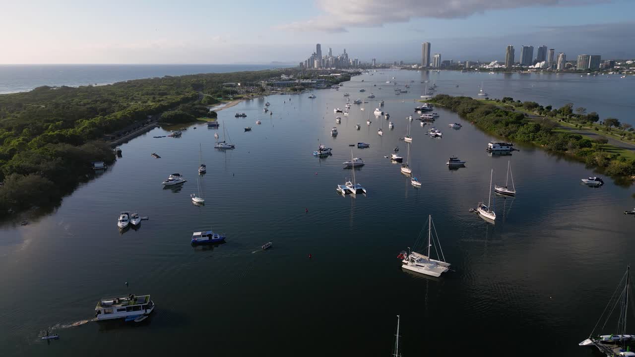 Forward moving aerial view over Doug Jennings Park looking South towards Surfers Paradise, Gold Coast, Australia.