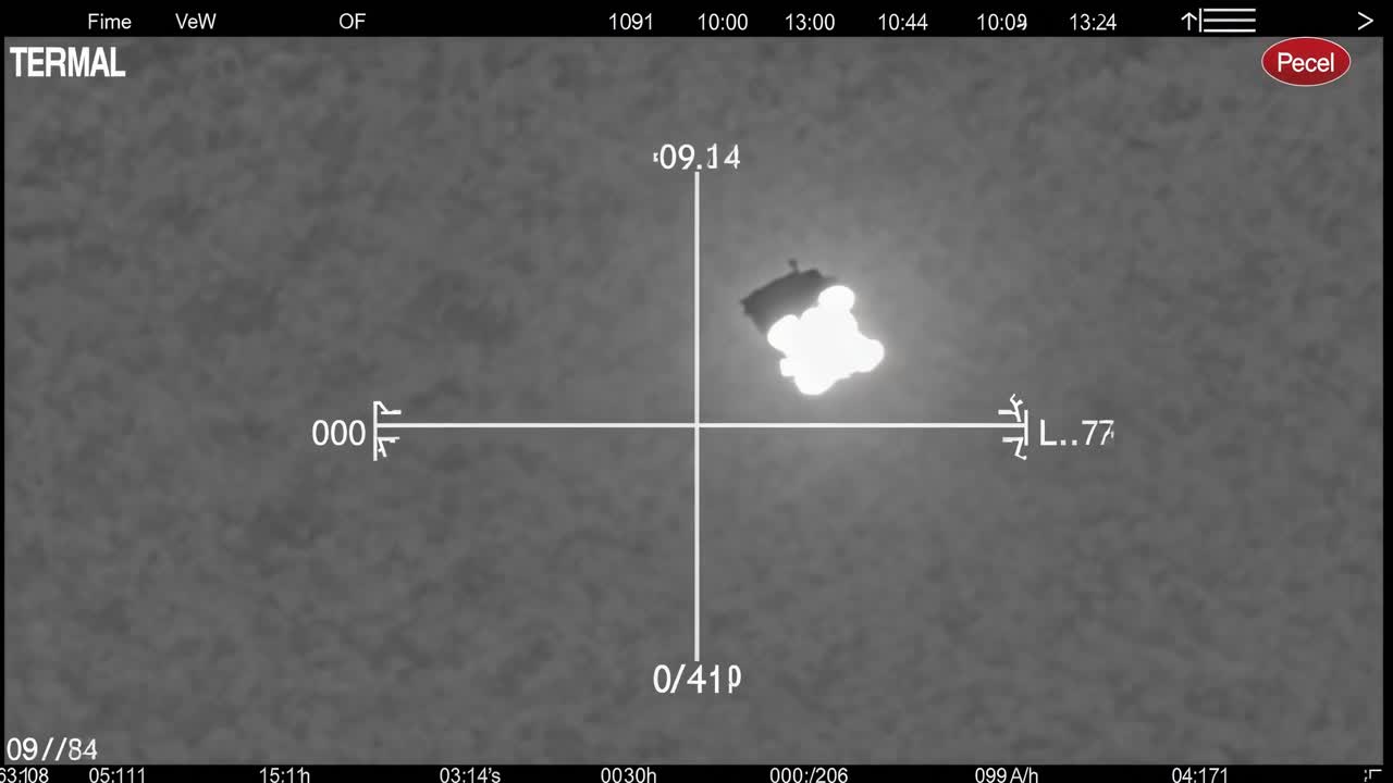 Thermal imaging sequence captures the gradual descent of an unidentified object, showcasing its movement and changing intensity in a captivating visual narrative