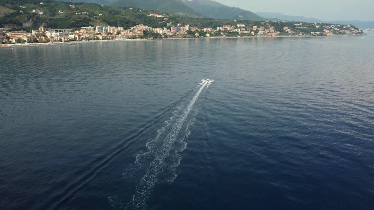 Coastal Cityscape with Boat on the Sea
