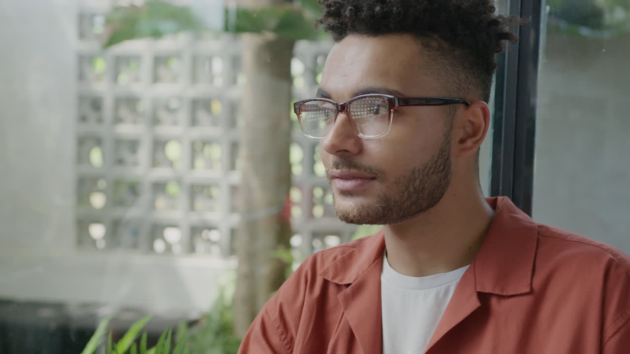 Young Brunette Woman Talking in Cafe