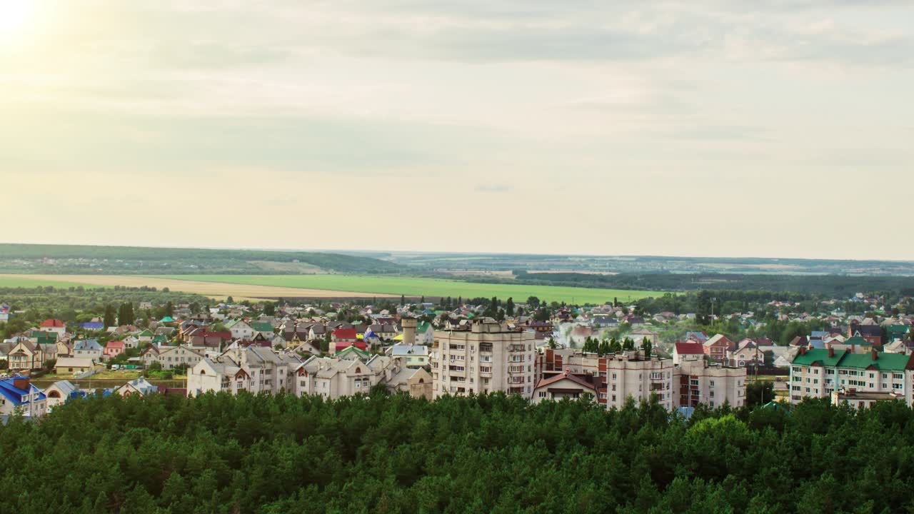 Aerial view of a cityscape with buildings and trees