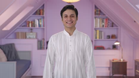 cute indian man smiling in kurta pajama