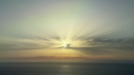 sunset at the golden minute shot from an airplane cabin flying westbound at 8000m high over the mediterranean sea