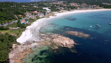 Aerial-Footage-of-a-Vacation-Resort-with-Amazing-Beach-and-Clear-Emerald-Water