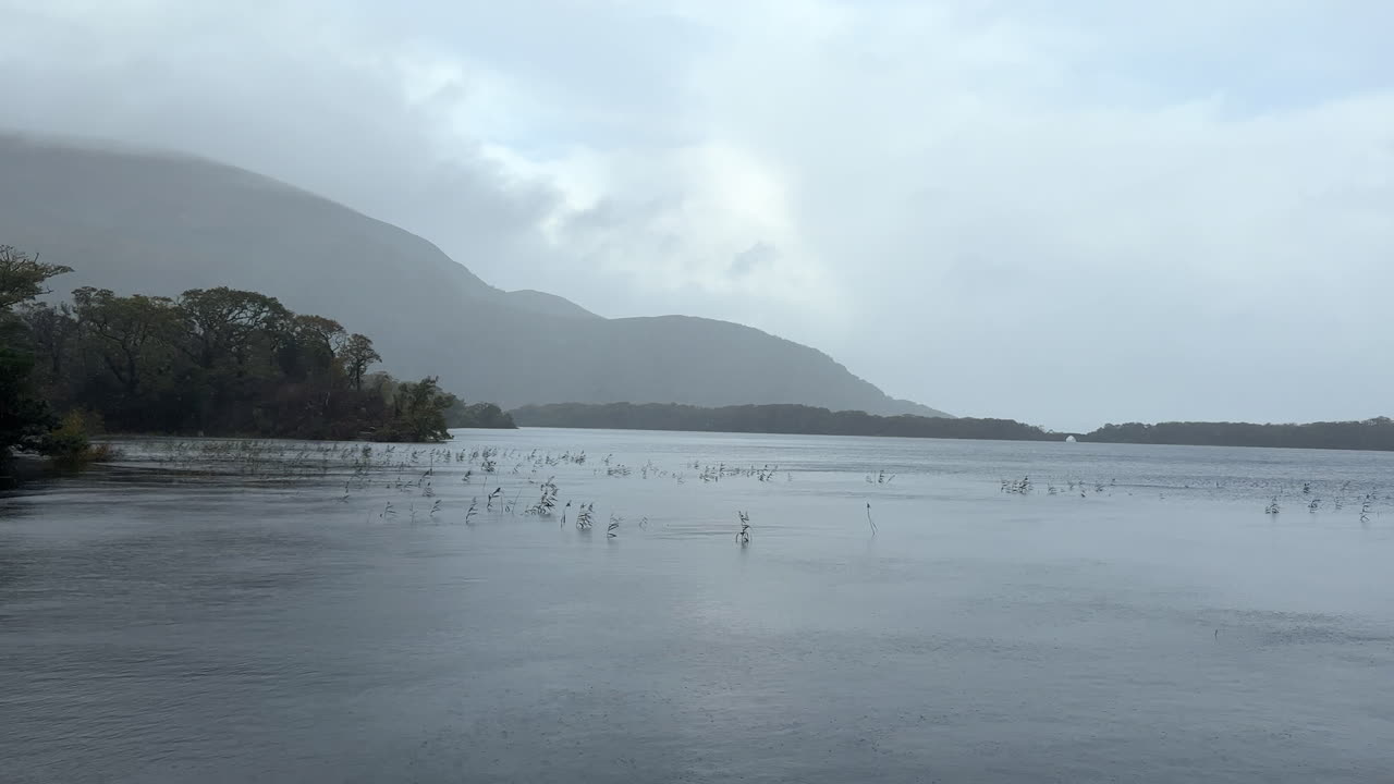 Muckross Lake during a rainy, overcast day in County Kerry, Ireland