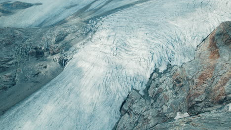 fellaria glacier in the alps from above during spring