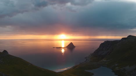 norwegian spectacular nature landscape view, drone flyover andøya island capturing coastal måtind mountains cape at sunset golden hours