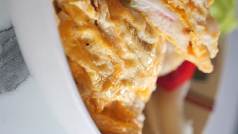 delicious ham and pesto sandwich with melted cheese