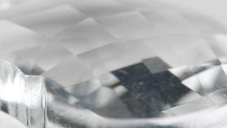 macro shot of diamond like quartz rock rotating around