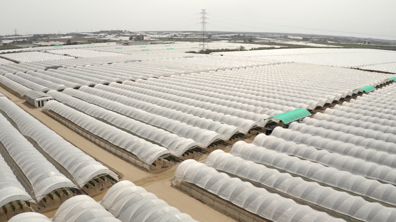 Aerial footage of large greenhouse farm