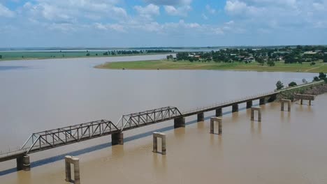 steel bridge with concrete over dam