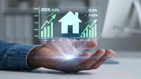 hand holding a hologram of a house with growth charts