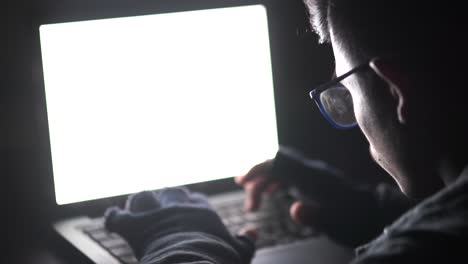 person working late night on laptop