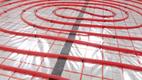 installing underfloor heating pipes for water heating. heating systems. pipes for a heat-insulated floor.