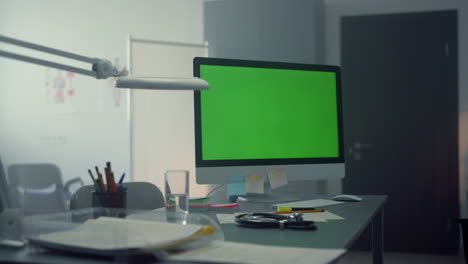 Computer-monitor-mockup-placed-doctor-desk-close-up.-Empty-technologic-workplace