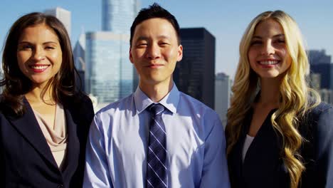 portrait of ethnic business managers on chicago rooftop