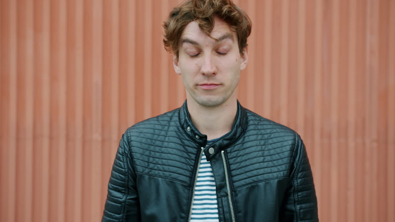 Man Yawning and Looking Tired