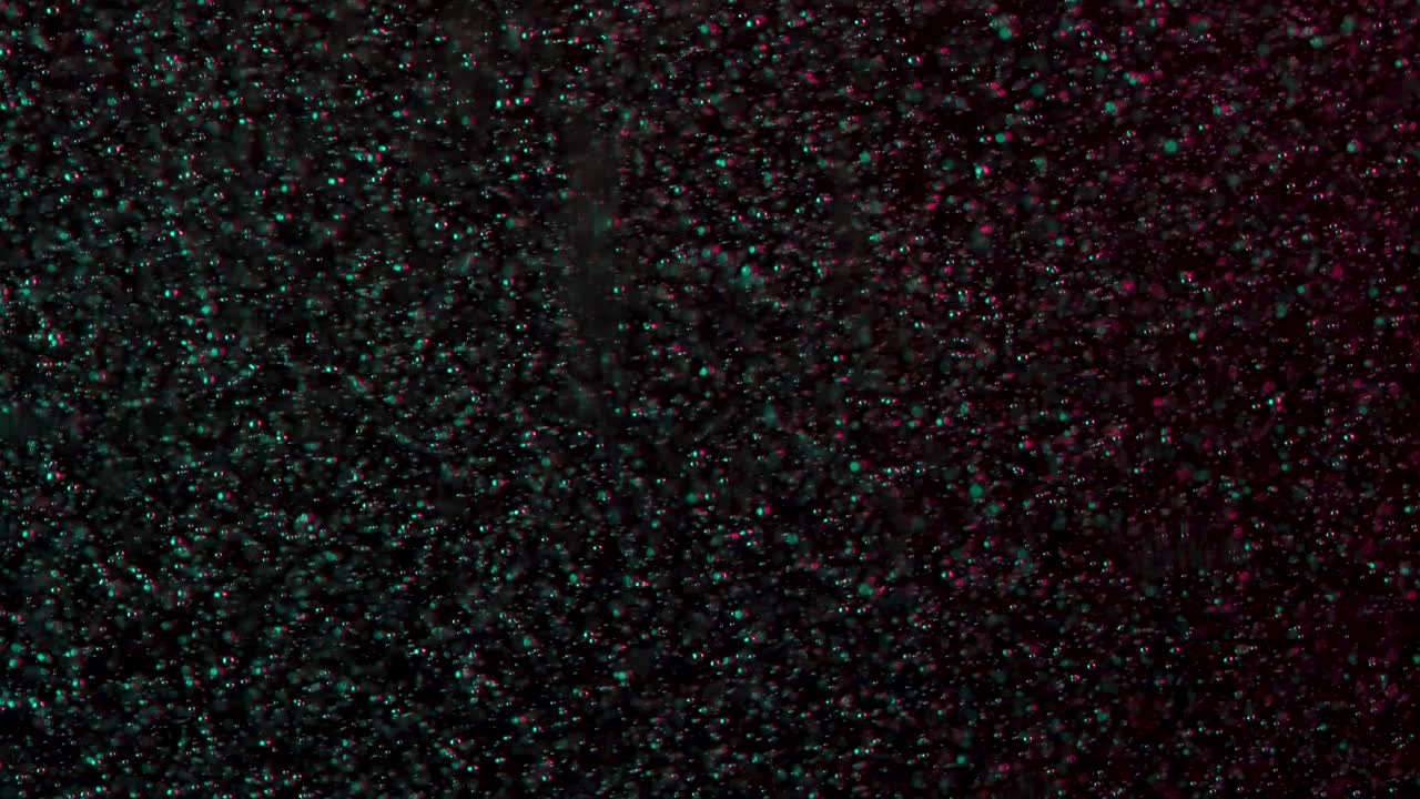 las burbujas verdes y rojas efervescen en un brillo navideño festivo