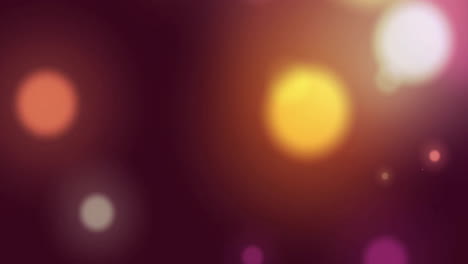 animation of glowing light spots over dark background