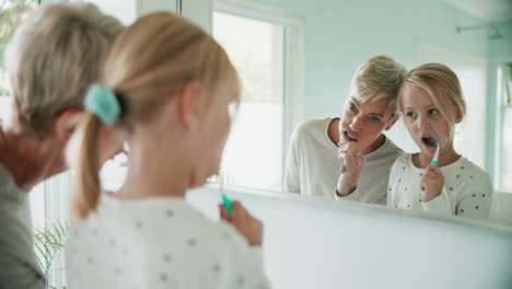 Grandmother,-grandchild-and-brushing-teeth