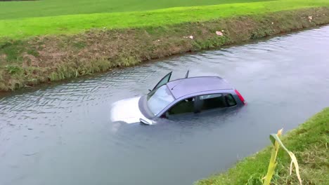 car accident with vehicle in the river