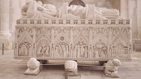 medieval tomb sculpture with intricate carvings