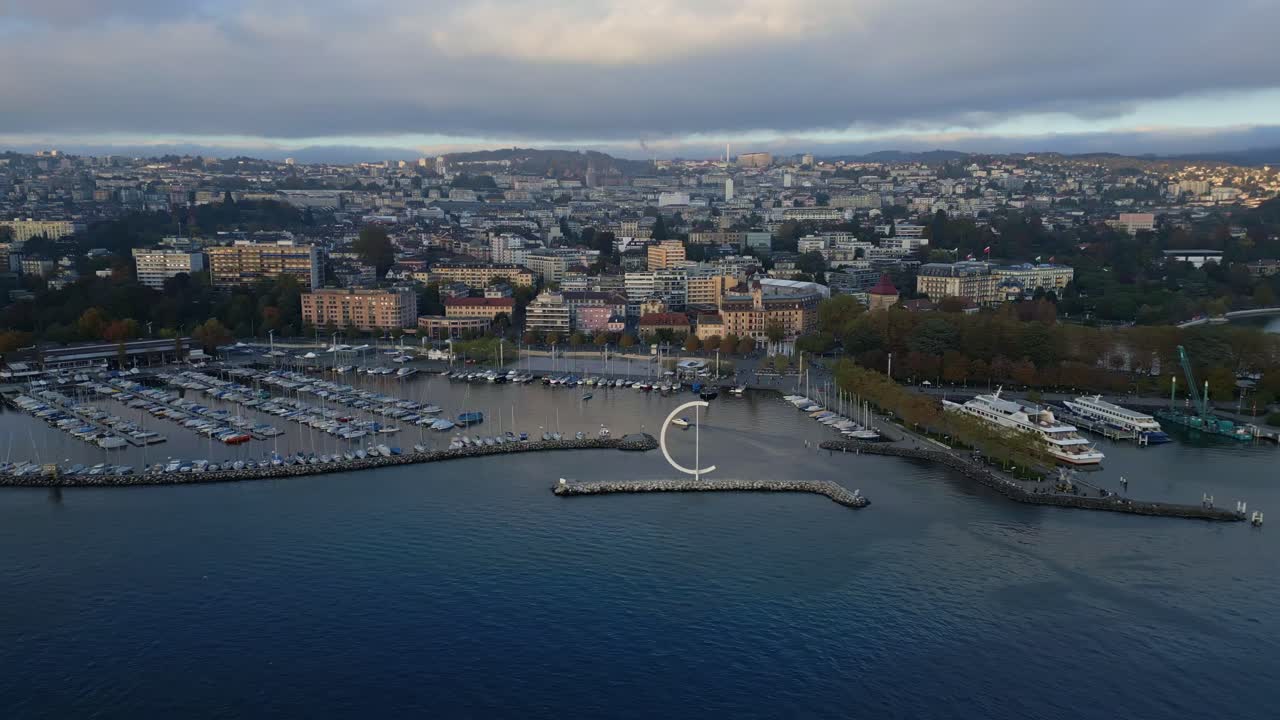 Aerial View of a City with a Marina on a Lake