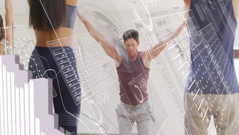 fitness partners performing routine in bright studio, with holographic currency charts projecting
