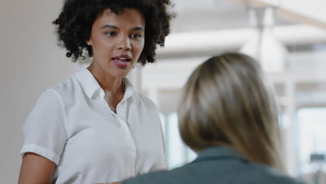 business-people-meeting-in-boardroom-mixed-race-team-leader-woman-presenting-financial-strategy-with-graph-data-on-tv-screen-briefing-colleagues-discussing-ideas-in-office-presentation