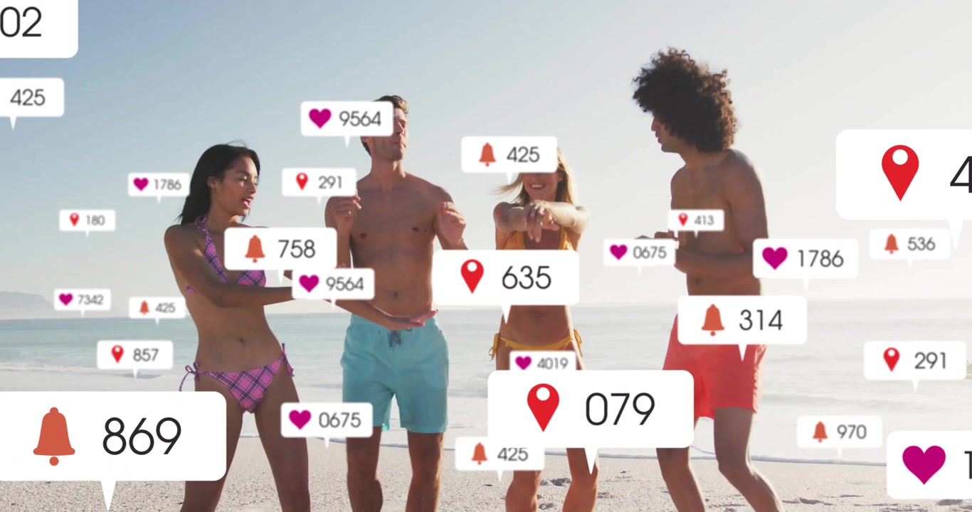 Venner ankommer til stranden, klapper og danser, mens de skaber hjerte-, nåle- og klokkeikoner til sociale medier