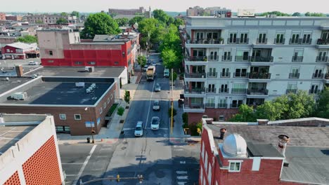 Cars-travel-down-a-one-way-street-in-a-small-city-in-America