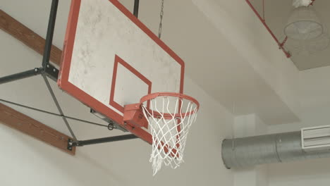 Close-Up-of-a-Basketball-Missing-the-Hoop