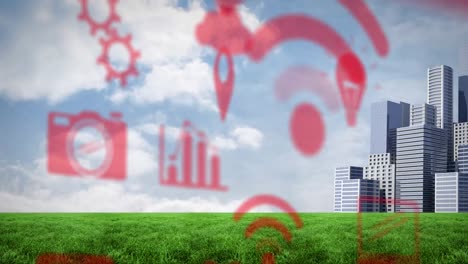 Animation-of-red-icons-over-grassy-field-and-modern-buildings-against-cloudy-sky