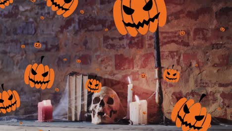 animación de calabazas de halloween sobre velas y cráneo en el fondo de la pared de ladrillo