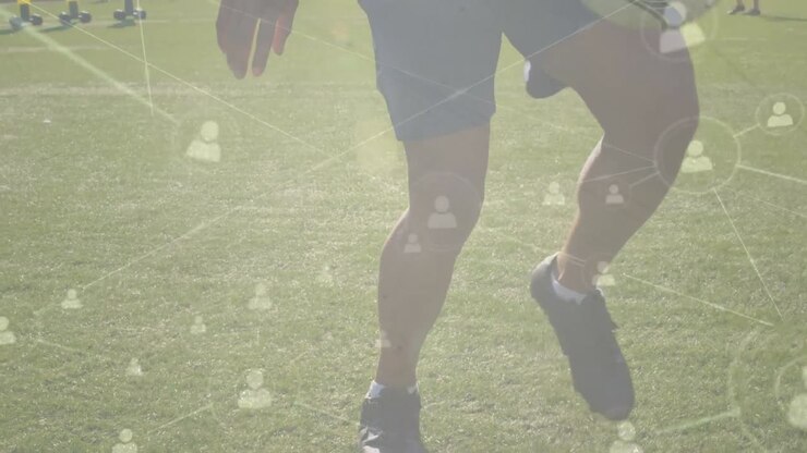 Animazione di elaborazione dati su un calciatore maschio caucasico che calcia un pallone