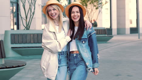 two friends laughing outdoors