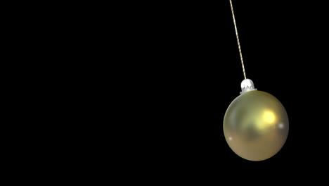 animation of christmas bauble dangling over black background