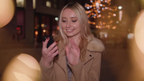 young woman searches for the perfect christmas gift and is excited when she finds it - in slow motion